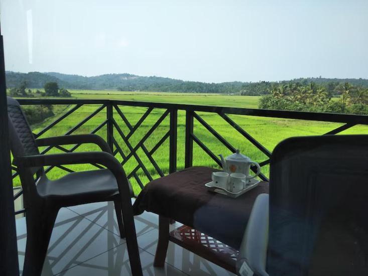 Paddyfield Inn マナンタバディー エクステリア 写真
